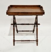 19th century butler's tray on stand, the tray with pierced integral handles, the folding stand