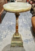 19th century French onyx lamp table of jardinière stand, the circular top with gilt metal frieze