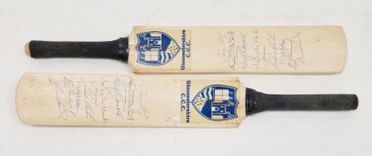 Two Symonds miniature Gloucestershire Cricket Club cricket bats, each with nine signatures including
