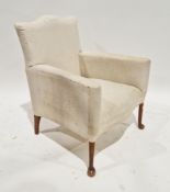 Early 20th century armchair with shaped top rail upholstered in a plain calico cream fabric, on