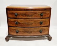 19th century mahogany bowfront chest of drawers, the caddy top over three long cockbeaded