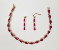 9ct yellow gold  and red stone bracelet and earring set, the bracelet set with a row of eighteen