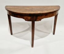 George III provincial elm demi-lune side table with shaped frieze, on three square tapering legs,