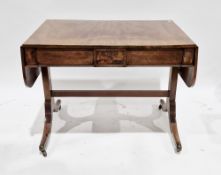 Mahogany sofa table in the Regency manner, the rectangular top over two frieze drawers on four