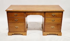 Pair of cherrywood bedside cabinets by Younger Furniture, each with a single drawer over an open