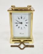 English made gilt-metal carriage clock by Worcester, the case with swing handle and bevel edged
