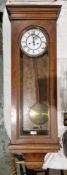 19th century walnut cased Vienna-style eight-day hanging wall clock, the glazed door opening to a