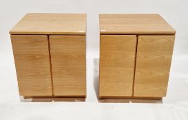 Pair of Beaver & Tapley veneered cabinets, both with two panel doors opening to an adjustable shelf,