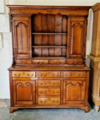 Brights of Nettlebed stained pine and oak dresser in the 18th century manner, the upper section