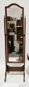 Early 20th century mahogany framed cheval mirror with domed top, the supports with carved finials,