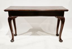 Mahogany buffet table in the George III Irish manner, the rectangular top with thumbmould edge, on