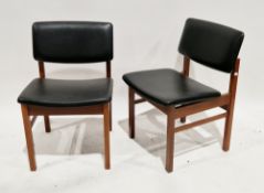 Pair of mid-century Scandinavian inspired teak dining chairs with black leatherette upholstered