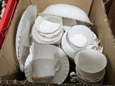 Royal Albert part tea service, plain white with gold rim, two Schweppes soda water bottles,