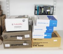 13 two-way walkie-talkie transceiver radios in boxes (some incomplete) by Yaesu, Baofeng, Uniden,