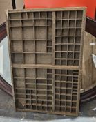 Oval mahogany framed wall mirror and a wooden printers type tray (2)