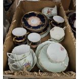 French Limoges porcelain part tea service by C Ahrenfeldt, gilt floral and foliate design on a