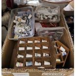 Quantity of vintage ceramic and metal thimbles depicting various scenes including animals and