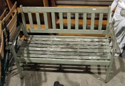 Green painted garden bench