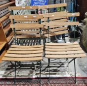 Four folding wood and metal bistro style chairs (4)