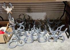 Magazine stand, three pyramid three-bottle wine racks, one three-bottle tower wine rack and a