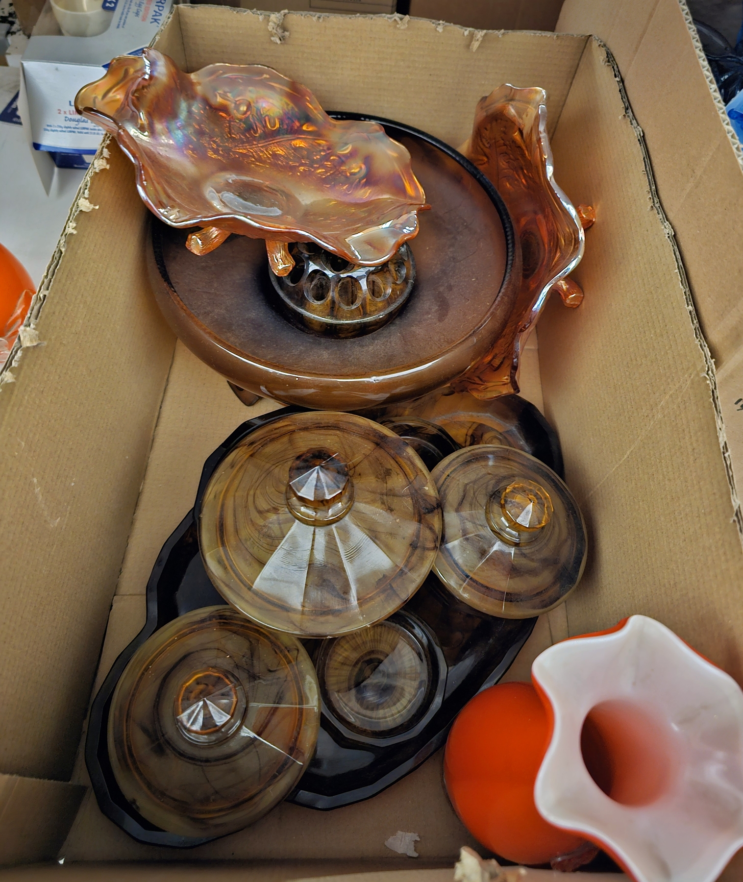 Pair of vintage Chinese orange cased glass plum blossom decorated vases, an iridescent carnival