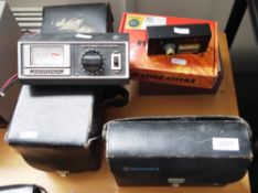 Two Motorola S-1350 RF power meters with a quantity of associated adapters, a Hansen FS-711H meter