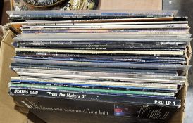 Approximately 40 rock/soft metal vinyl LPs including Rainbow, Long Live Rock 'n' Roll, Saxon, Status