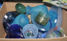 Assorted coloured glass including two Venetian-style spatter glass fish, Wedgwood owl paperweight,