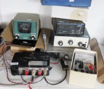 Various pieces of electronic test equipment including TT-145 transistor checker, PM6668 high