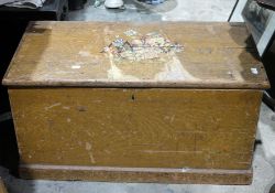 Pine storage chest with wrought iron and decorated with various stickers