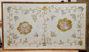 Chinese-style framed embroidery featuring lotus flowers amongst foliate borders