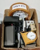 Box of clocks including a radio controlled alarm clock, a London Clock Company mantel clock, two