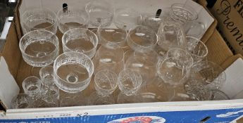 Eleven Carlsberg beer glasses with gilt rims, five Guinness glasses and a quantity of drinking