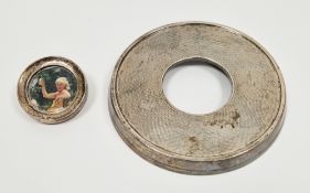 Silver engine turned and bakelite mounted circular stand, with central aperture, hallmarked