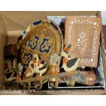 Various carved wooden models of elephants, a group of papier mache eggs and lacquered eggs, a