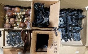 Box of reeded hardwood door knobs, boxes of scroll cast window latches and catches and a box of