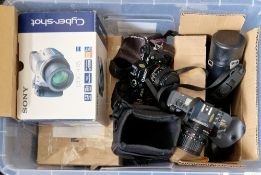 Collection of cameras, lenses and associated items including Canon cameras A1, T70(x2), AV1 and AE1,