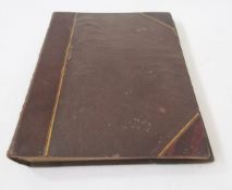 Victorian album of armorial crests and ciphers, many embellished with watercolours and gilding, full