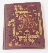 Album of Victorian 'Scraps', postcards and greetings cards, maroon gilt decorated cloth