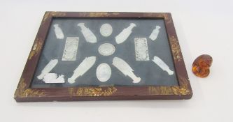 Japanese carved amber netsuke in the form of a fox, 2.5cm high, and a small collection of Asian