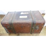 A mid 20th century canvas and wood bound trunk