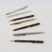 Concorde ballpoint pen, two ballpoints and one fountain pen by Pierre Balmain, a Cross propelling