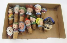 13 novelty bottle stoppers, most being ceramic characters, and a millefiori glass example (13)