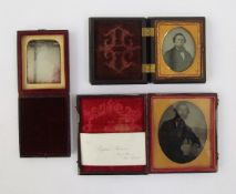 Three Victorian daguerreotype photographic portraits including one of a gentleman in period dress,