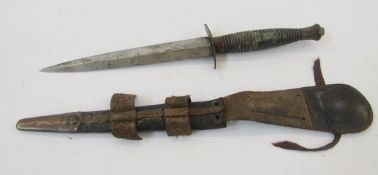 WWII Fairbairn Sykes fighting knife in leather scabbard (please note VAT will be payable on the