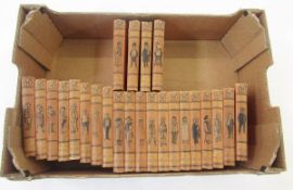 Punch's Library of Humour, 24 vols, red cloth with pictorial backstrips and gilt titles, all
