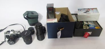 Canon AE1 35mm SLR camera, serial no.2743084 with Canon zoom lens 35-70mm, a Sigma zoom 17-35mm