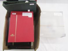 World stamps: Large box of 9 albums/stock-books plus plastic carton of stamps mostly from Antigua,