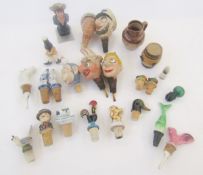 Quantity of assorted collectables including novelty bottle stoppers, some papiermache ceramic