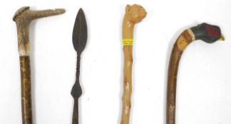 Leather stickstand in the form of an artillery shell carrier, 50cm high together with a quantity